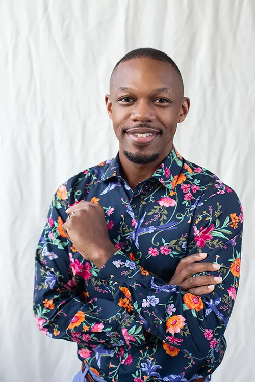 Professional headshot of Dr. Jerrod Handy-Robinson, a prescribing psychologist specializing in culturally competent mental health services for the LGBTQ+ community, particularly sexual, racial, and gender minorities.